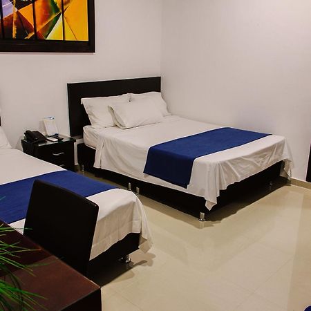 Hotel la Ciudad Barrancabermeja Habitación foto