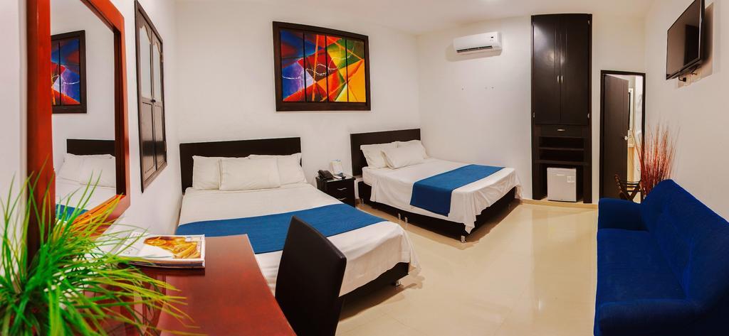 Hotel la Ciudad Barrancabermeja Habitación foto