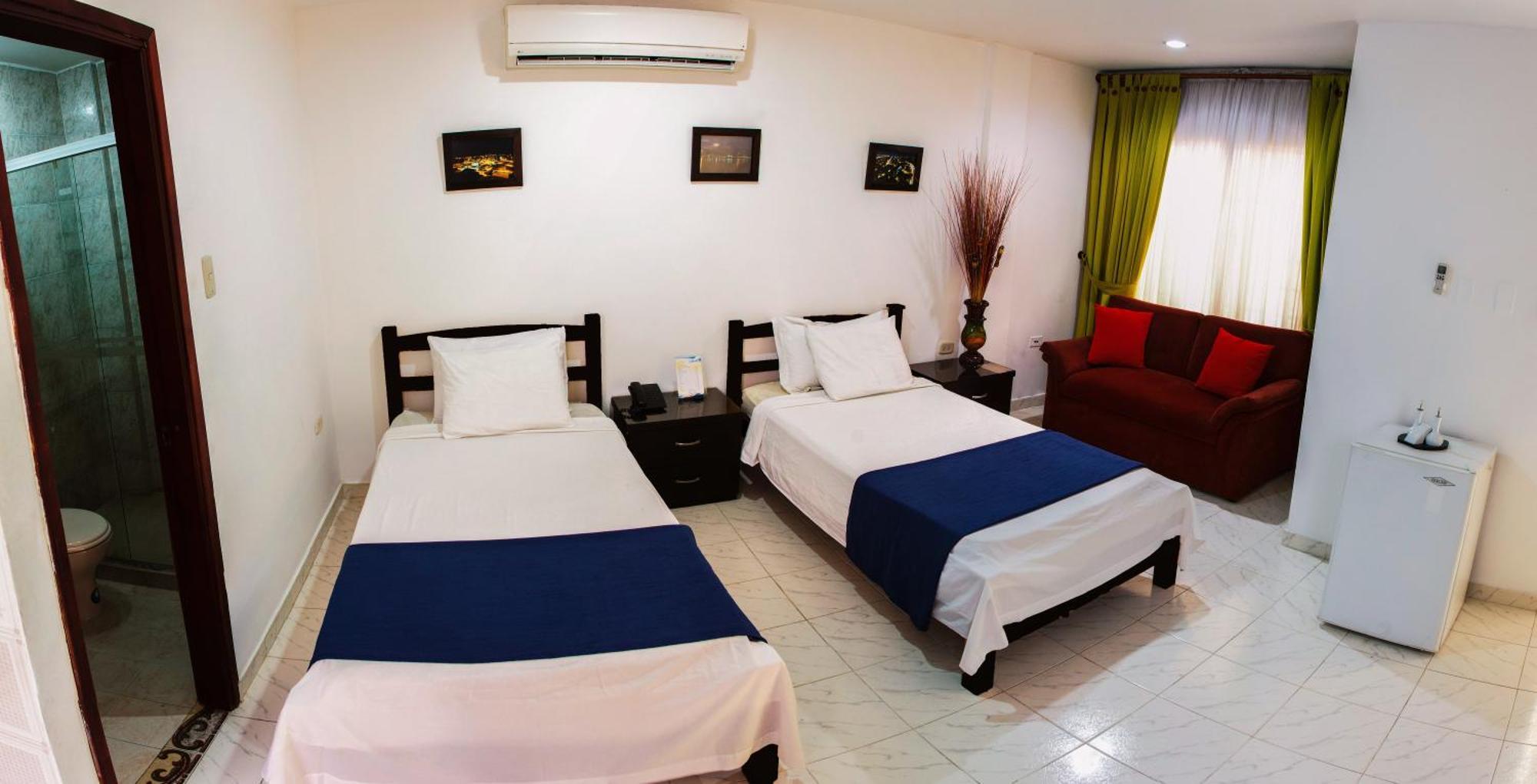 Hotel la Ciudad Barrancabermeja Habitación foto