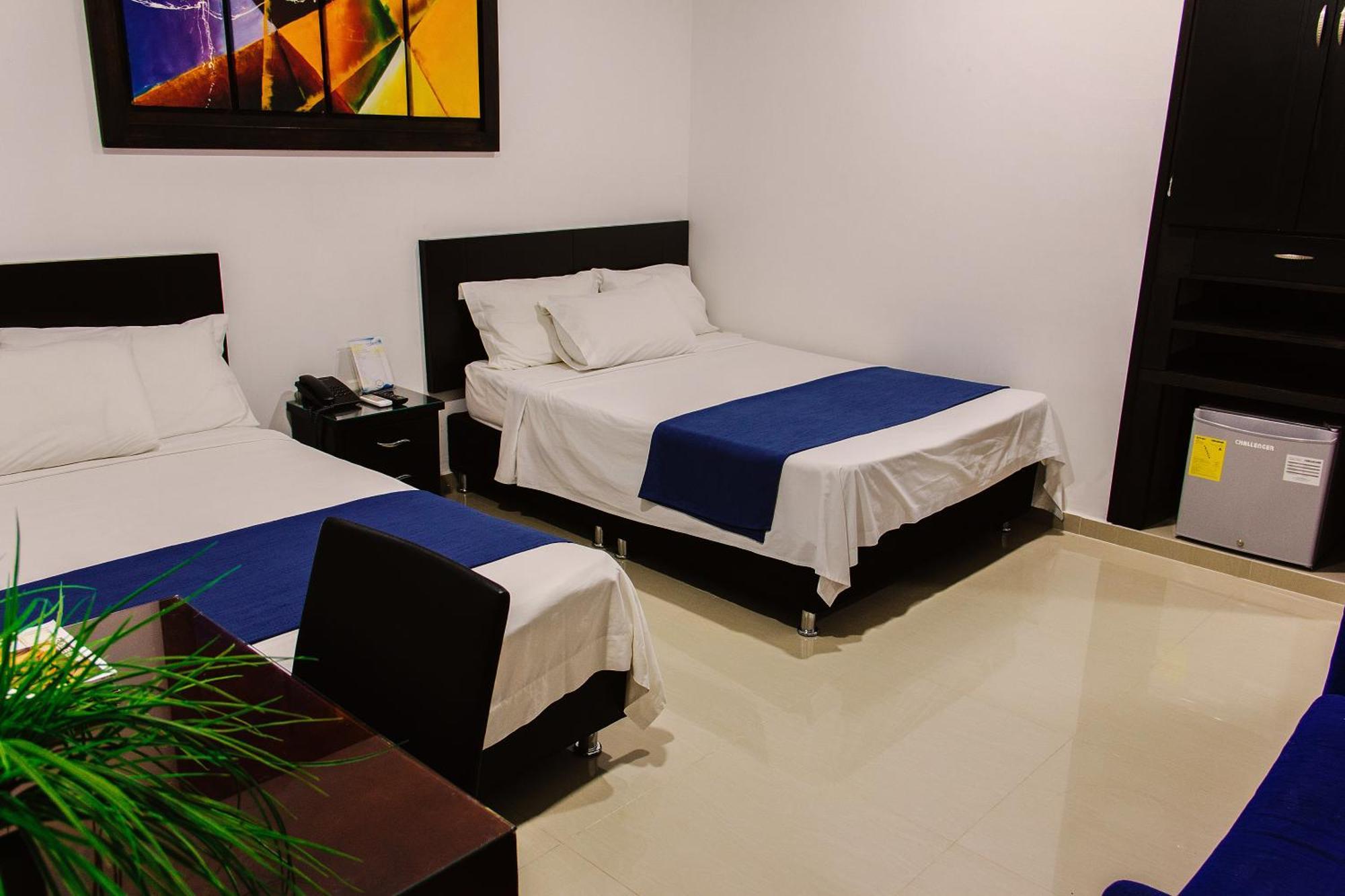 Hotel la Ciudad Barrancabermeja Habitación foto