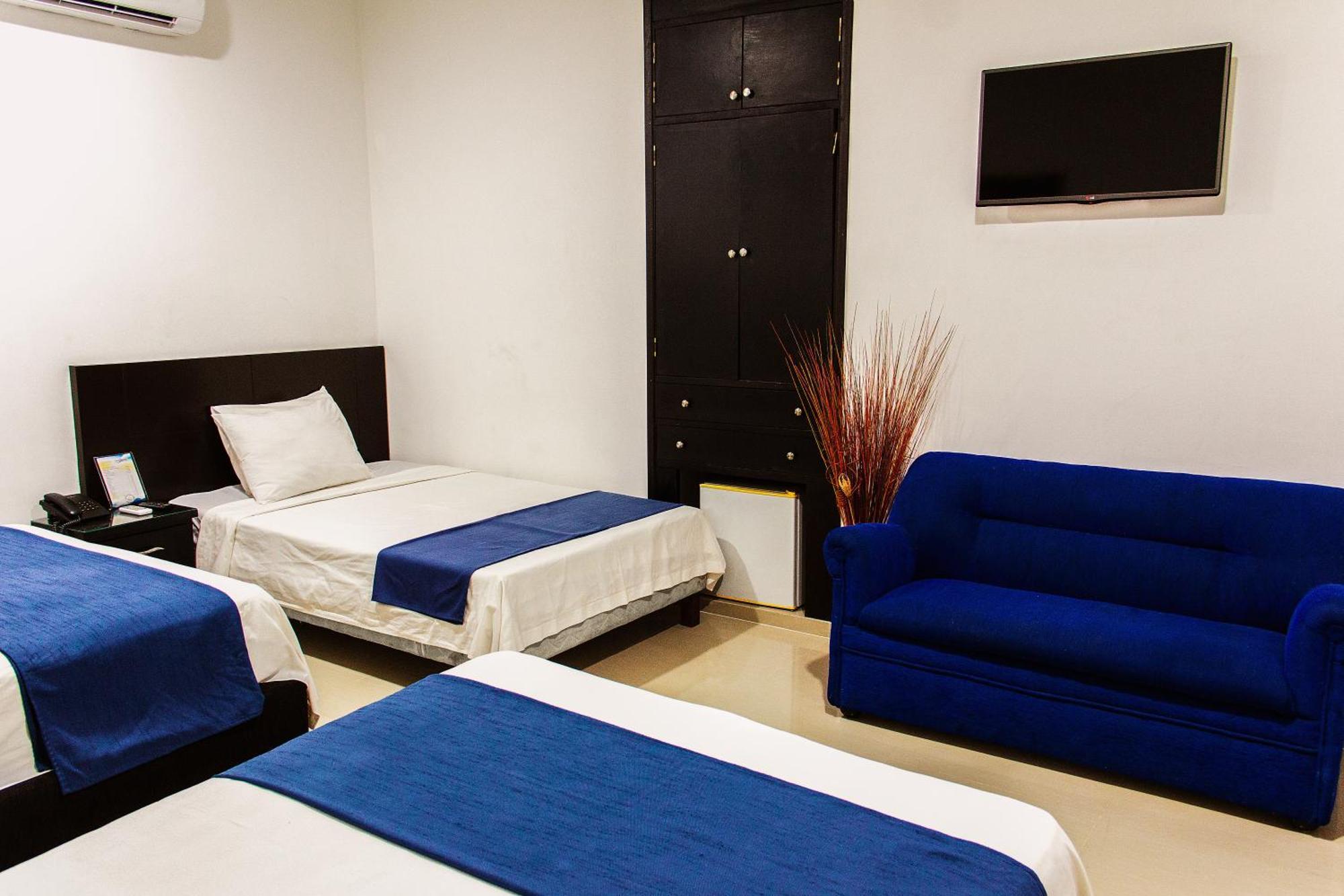 Hotel la Ciudad Barrancabermeja Habitación foto