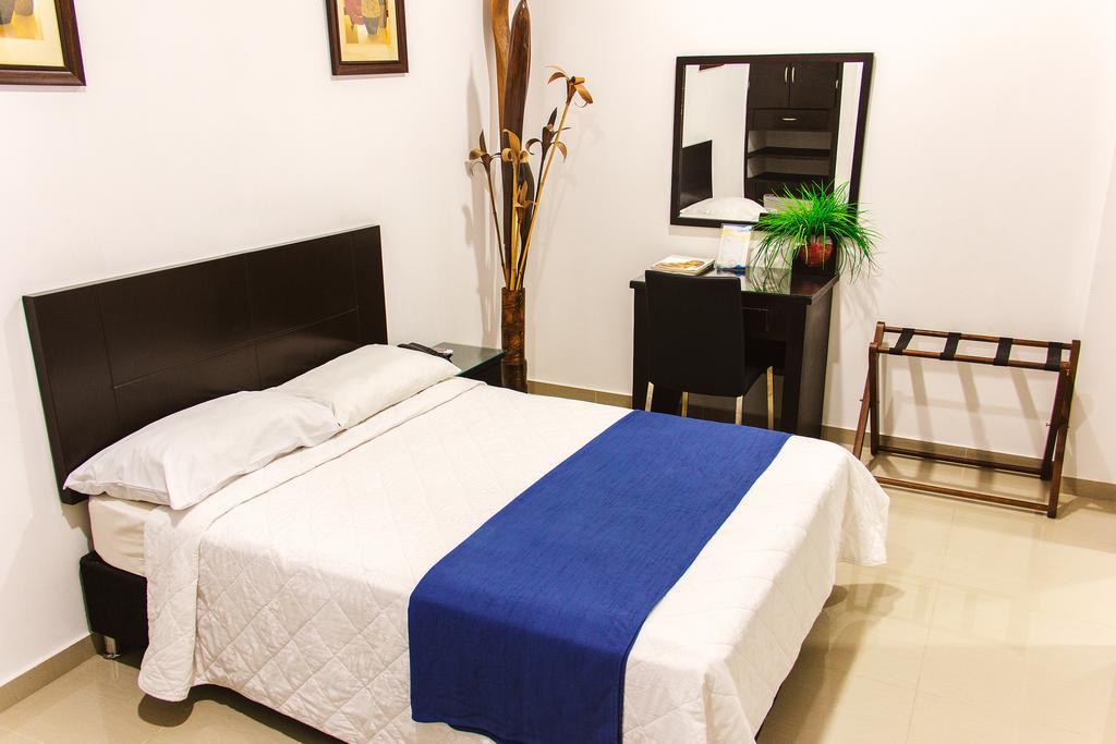 Hotel la Ciudad Barrancabermeja Habitación foto